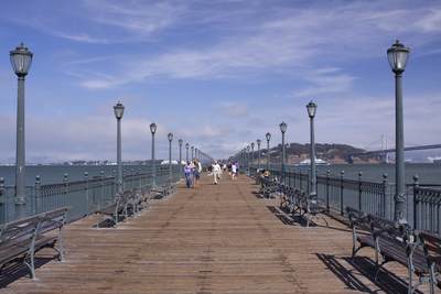 A view along Pier 7 (a fishing pier) on Fisherman's Wharf looking towards Yerba Buena Island in San Francisco in California in the United States of America USA U.S.A.
