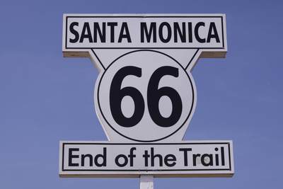 One of two markers indicating the end of Route 66 (a.k.a. Will Rogers Highway) which starts in Chicago and finishes in Los Angeles located on Santa Monica beach near the pier in Los Angeles, California, United States of America USA U.S.A.