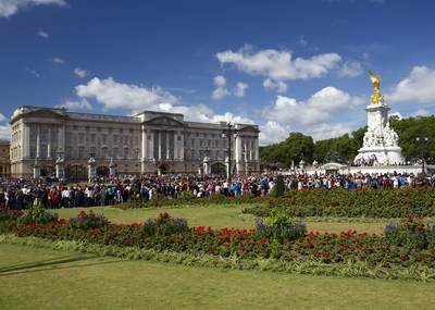 Crowds gather for the Changing of the Guards at Buckingham Palace in central London in the United Kingdom