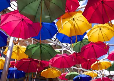 Public art installation of colourful umbrellas at Borough created for the Olympic celebrations in 2012 in Southwark in central London