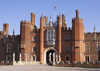 The facade of Hampton Court Palace in East Molesey in Surrey in the United Kingdom
