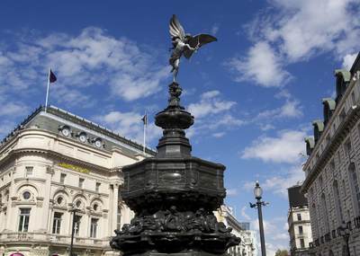 The statue of Eros in Piccadilly Circus in the sunshine in central London in the United Kingdom
