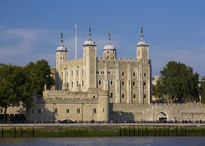 Historic building of the White Tower at the Tower of London viewed across the River Thames in central London in the United Kingdom