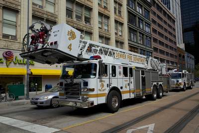 Denver Fire Department truck (engine/appliance) on California Street in Denver, Colorado in the United States of America USA U.S.A.