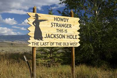 Wooden sign by Jackson Hole airport in Grand Teton National Park in Wyoming in the United States of America USA U.S.A.