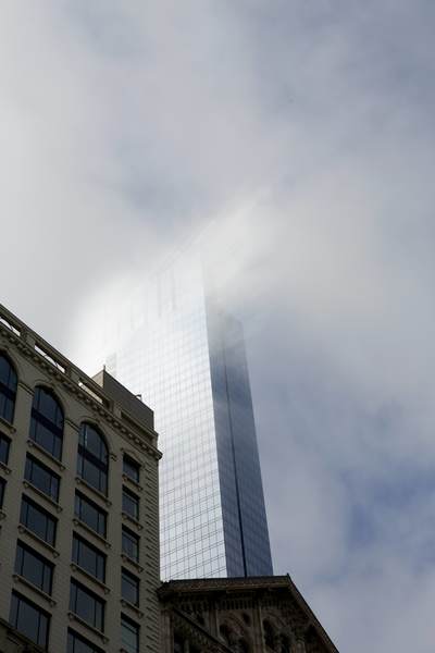 Rays of sunlight reflecting off of the Legacy Tower, accentuated by the fog -  at Millennium Park on South Wabash Avenue in Chicago (Windy City) in Illinois in the United States of America USA U.S.A.
