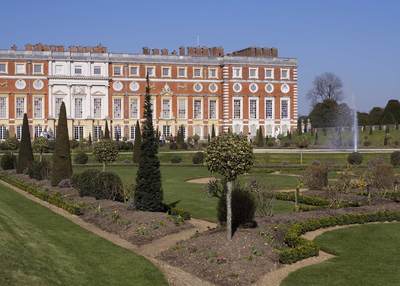 Hampton Court Palace and the Privy Garden in the spring in East Molesey, Surrey in the United Kingdom