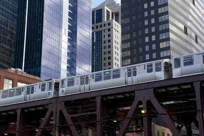 A train on the green line of the Chicago 'L' (short for elevated) metro system, the rapid transit system serving the city crossing Lake Street Bridge in Chicago (Windy City) in Illinois in the United States of America USA U.S.A.