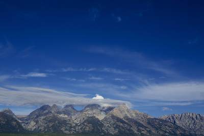 View across the Baseline Flats towards the Grand Teton range of mountains (Grand Teton, Middle Teton and Mount Owen) with the Teton glacier and Middle teton glacier visible Grand Teton National Park in Wyoming in the United States of America USA U.S.A.